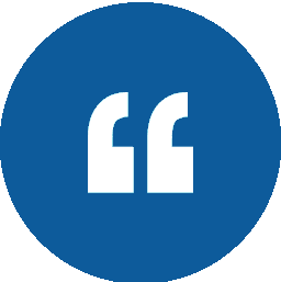 Blue circle with white quotation marks.